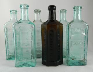 Appraisal: Medicine bottles Medicine- - Geometric form embossed on front on