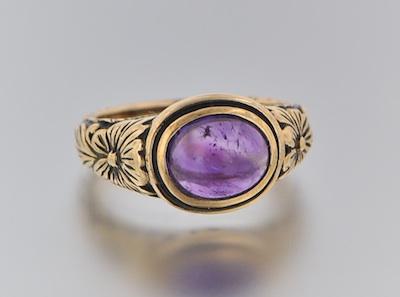 Appraisal: A Vintage Amethyst Cabochon Ring k yellow gold ring with