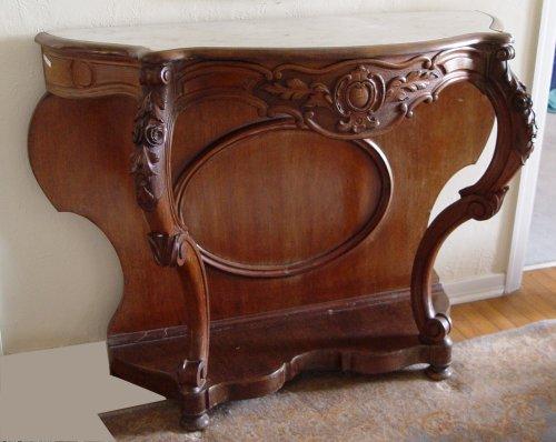 Appraisal: VICTORIAN CARVED WALNUT MARBLE TOP FOYER TABLE Sculpted white marble