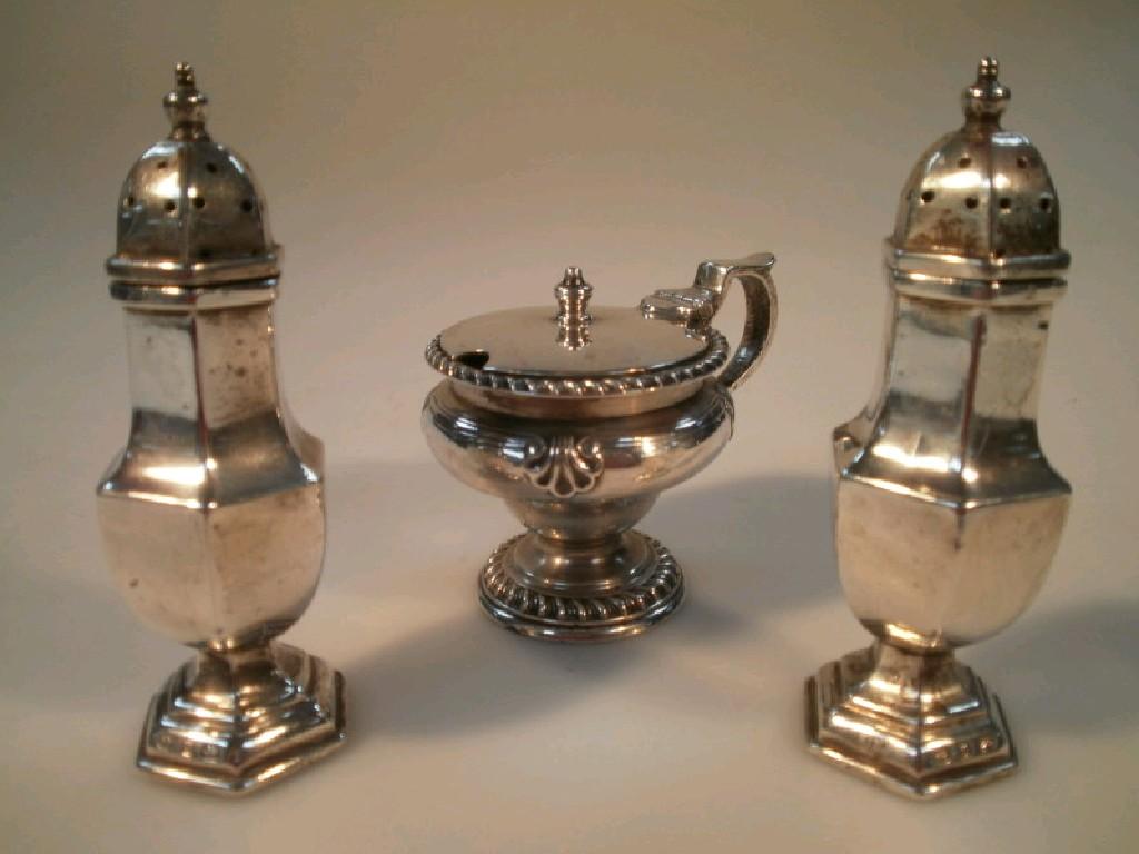 Appraisal: An Edwardian silver pedestal mustard by Elkington Birmingham and a