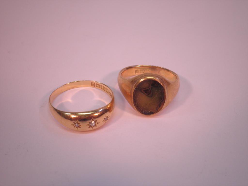 Appraisal: An ct gold gypsy set ring and a ct gold