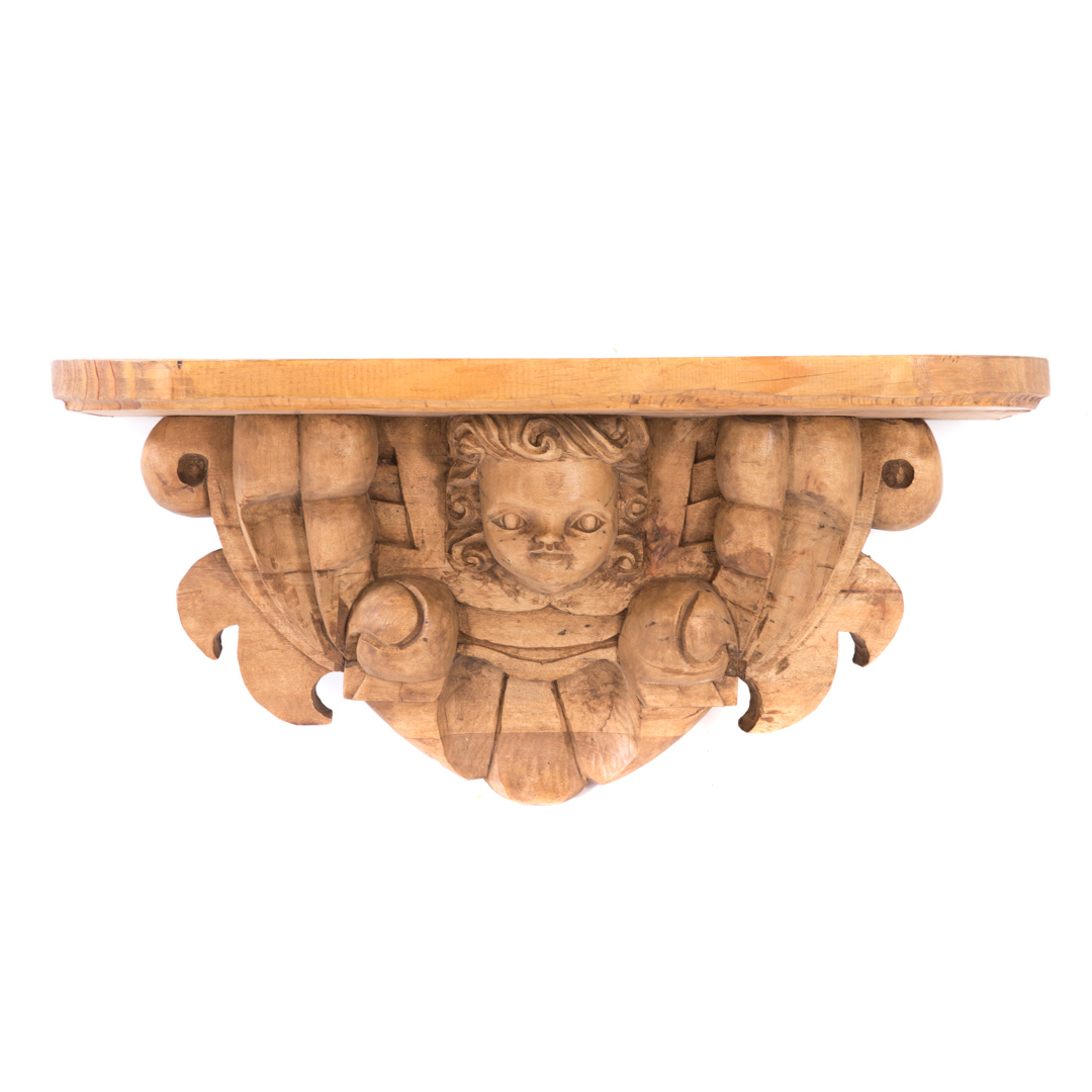 Appraisal: Mexican Baroque style pine wall shelf th century head of