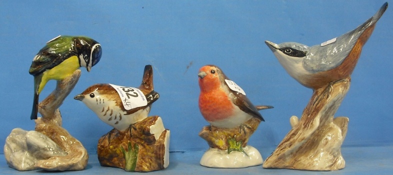 Appraisal: Excalibur Pottery Bird Models Comprising Wren Robin Blue Tit and