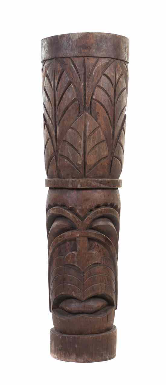 Appraisal: A Carved Wood Tiki Totem having incised leaves and facial