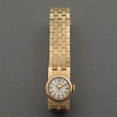 Appraisal: A lady's yellow gold wrist watch by Rolex on a