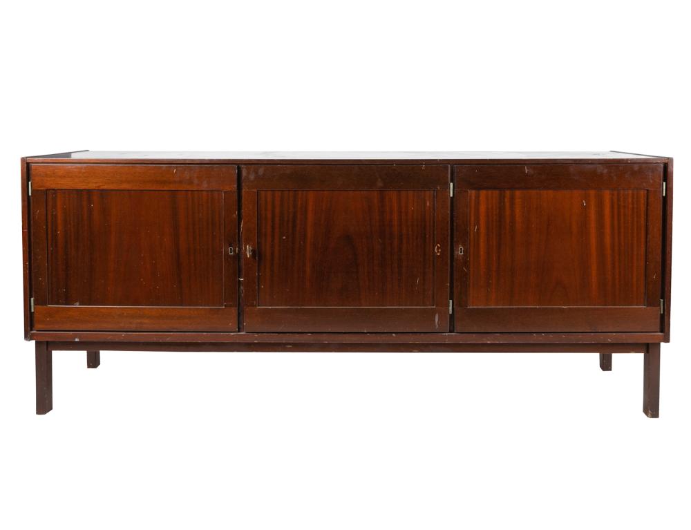 Appraisal: MID-CENTURY MAHOGANY SIDEBOARDunsigned with three hinged doors each opening to