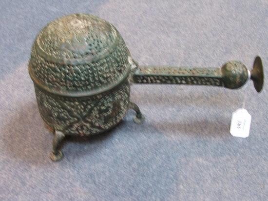 Appraisal: A PERSIAN PIERCED BRONZE CENSER with incised decoration in Khorassan