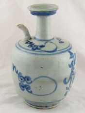 Appraisal: A Chinese bottle jar with pouring spout and freehand blue