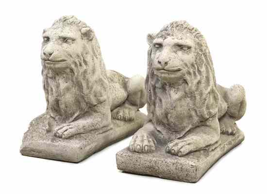 Appraisal: A Pair of Cast Stone Lions each depicted in a