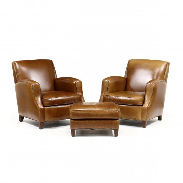 Appraisal: CRATE BARREL PAIR OF LEATHER CLUB CHAIRS AND OTTOMAN Late