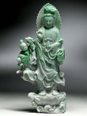 Appraisal: APPLE GREEN JADEITE GUANYIN Well carved Chinese carved bright apple