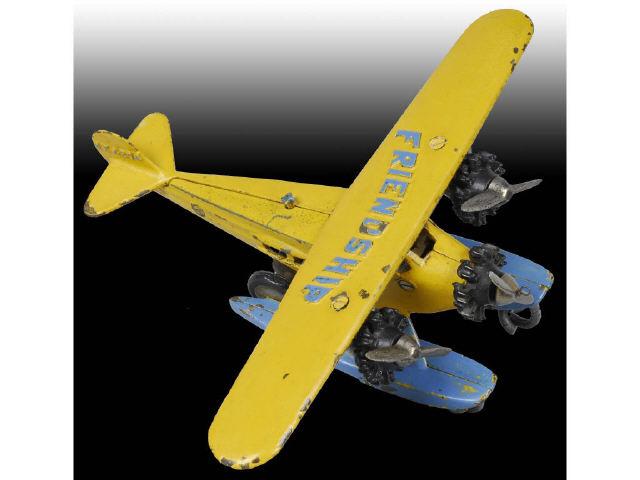 Appraisal: Cast Iron Hubley Friendship Airplane Toy Description Painted yellow with