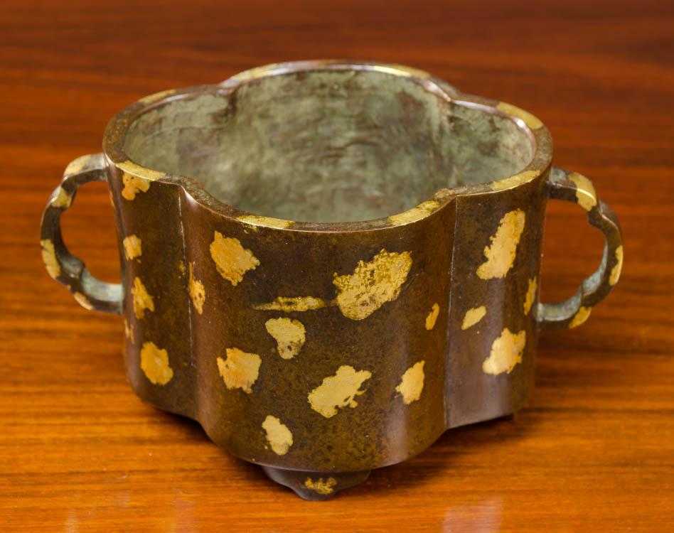 Appraisal: CHINESE GOLD SPLASH BRONZE CENSER with lobed walls and double