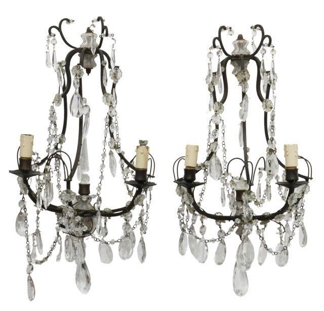 Appraisal: pair Italian wrought iron and crystal sconces th c having