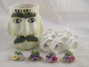 Appraisal: A group of nine ceramic napkin rings and four menu