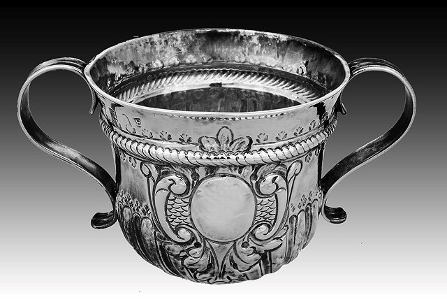 Appraisal: A GEORGE I BRITANNIA GRADE SILVER PORRINGER with fluted lower