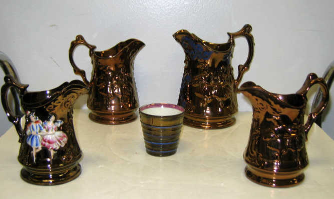 Appraisal: FIVE PIECES OF ENGLISH COPPER LUSTRE WARE Four graduating in