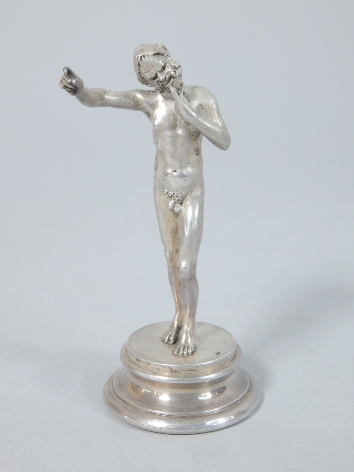 Appraisal: A French white metal model of a faun stamped to