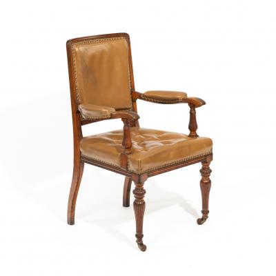 Appraisal: An armchair attributed to Lamb of Manchester with button upholstered