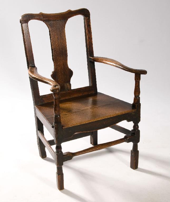 Appraisal: PROVINCIAL CHIPPENDALE OAK OPEN ARMCHAIR with vasiform splat above a