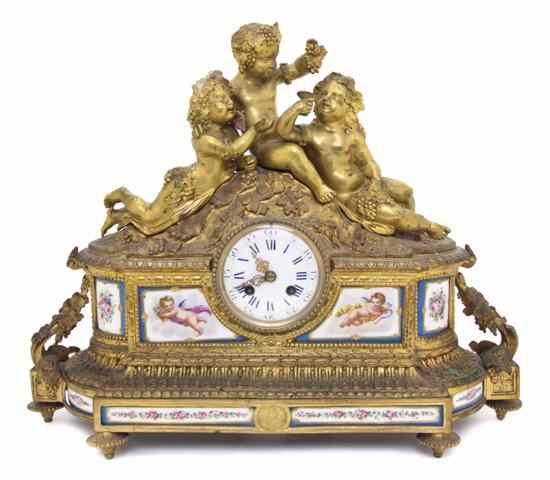 Appraisal: A French Gilt Bronze and Sevres Style Porcelain Mantel Clock