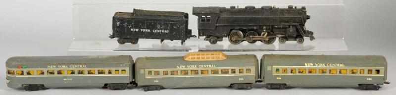 Appraisal: Marx O-Gauge Electric Passenger Train Set American Includes steam-type engine