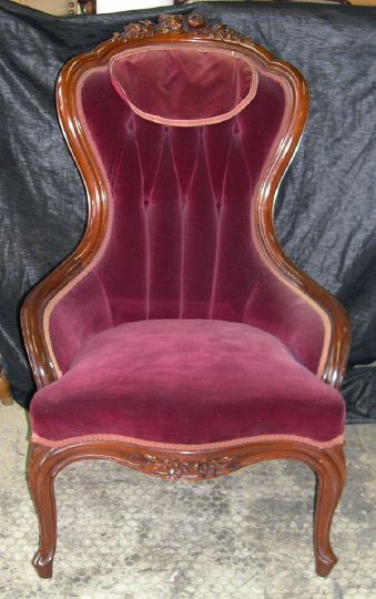 Appraisal: Rococo Revival-Style Mahogany Armchair late th century with carved crests