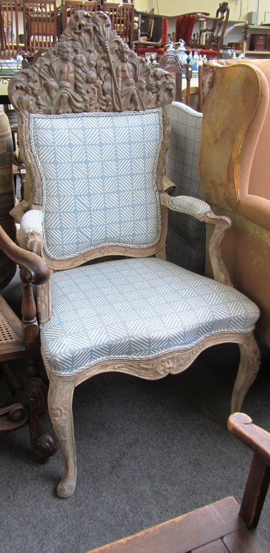 Appraisal: A th century stripped and limed beech open armchair with