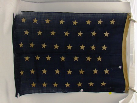 Appraisal: US Naval banner with blue wool field displaying machine embroidered