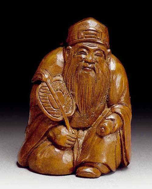 Appraisal: NETSUKE Japan Meiji Period H cm Wood The God of