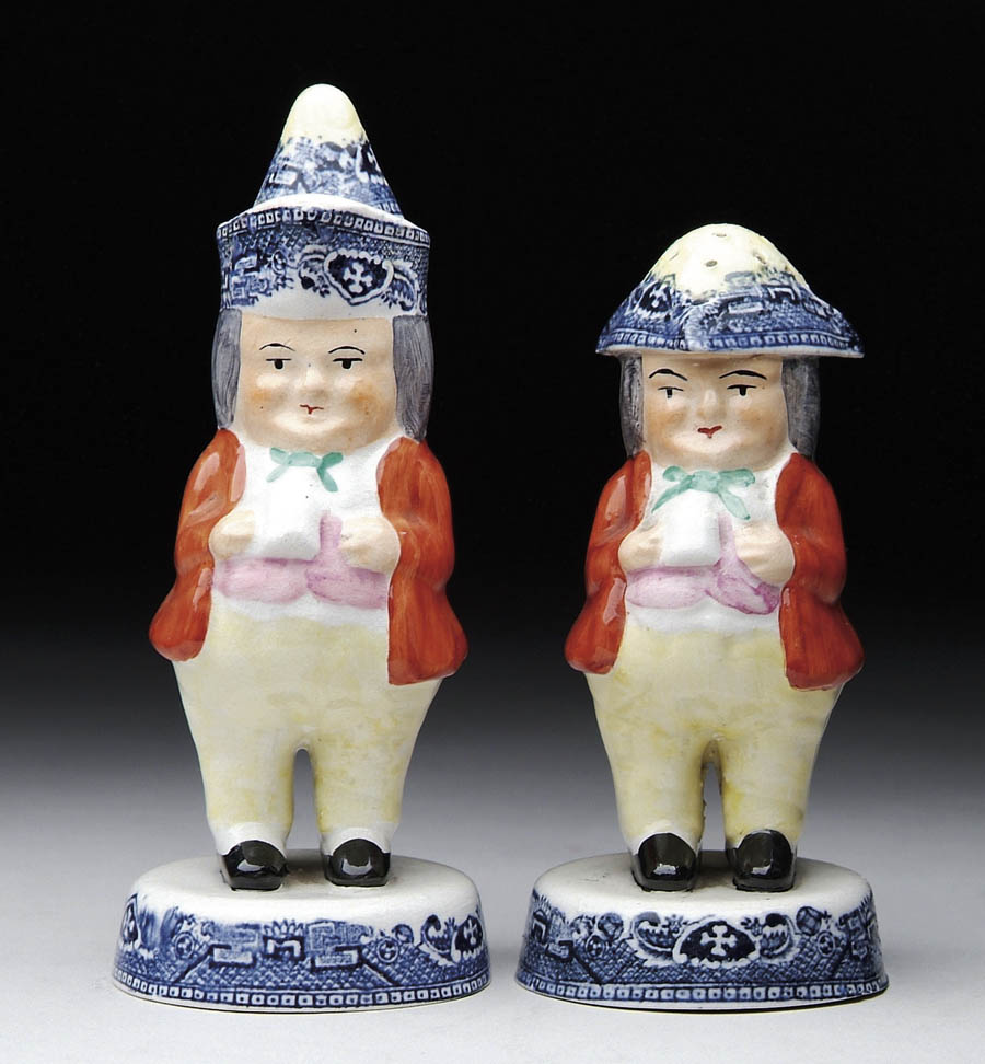 Appraisal: PAIR OF ANTIQUE STAFFORDSHIRE TOBY SALT AND PEPPER SHAKERS Late