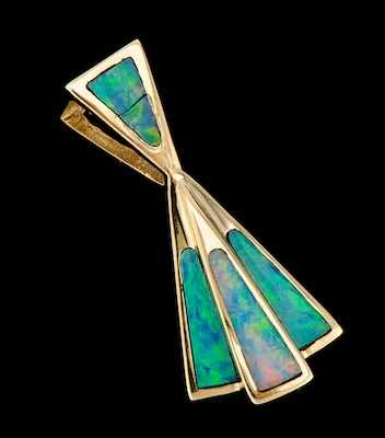 Appraisal: A Ladies' Black Opal Pendant k yellow gold pendant in