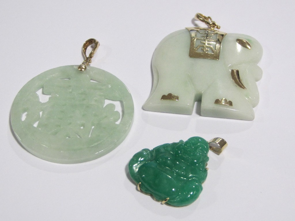 Appraisal: Three Chinese Jade pendants a good luck disc an elephant