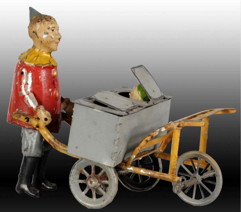 Appraisal: German Tin Wind-Up Clown Pushing Porter Cart Toy Description Wind-up