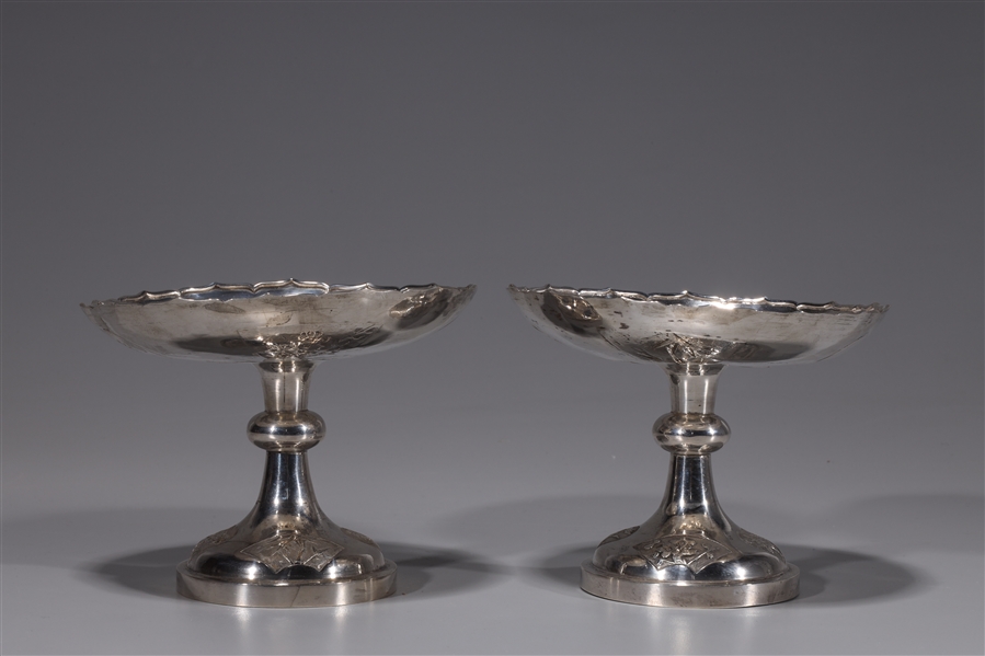 Appraisal: Pair of fine repousse silver Chinese tazzas each with Chinese