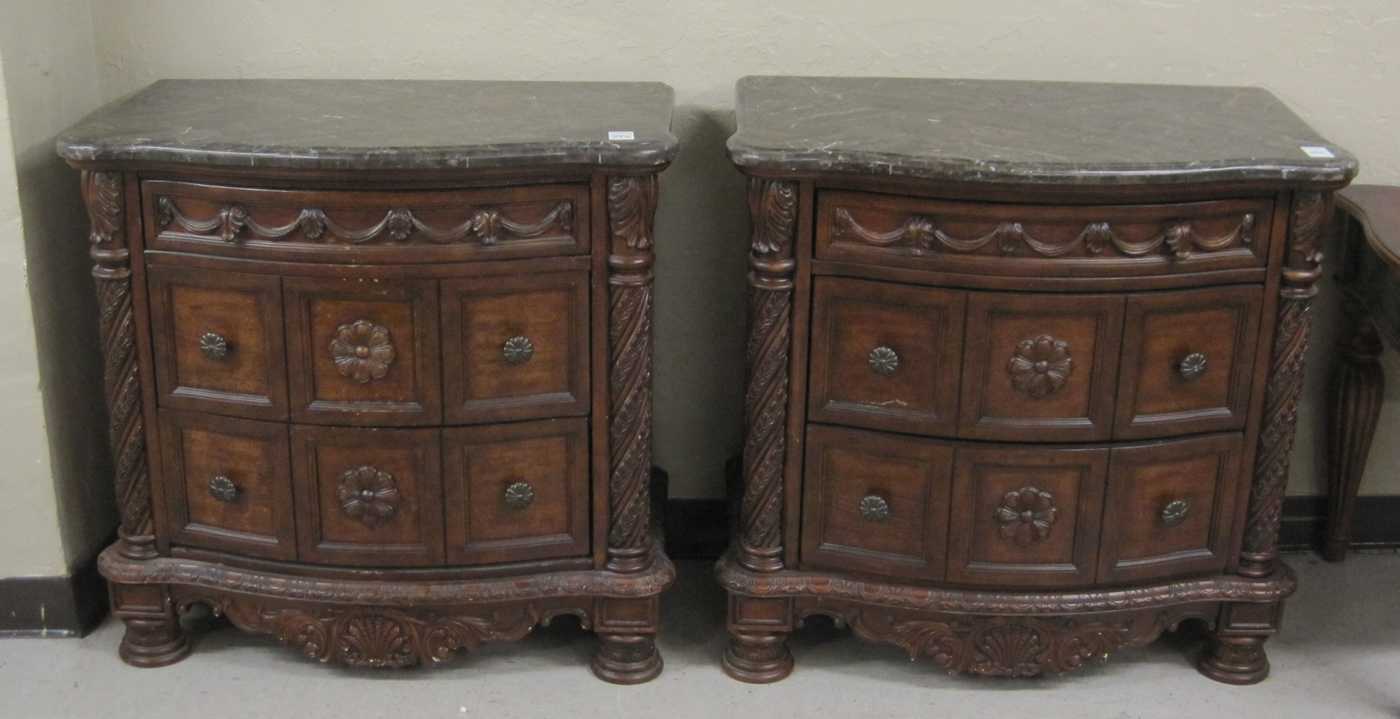 Appraisal: PAIR OF BOW-FRONT BEDSIDE CHESTS Ashley Furniture Industries antique reproductions