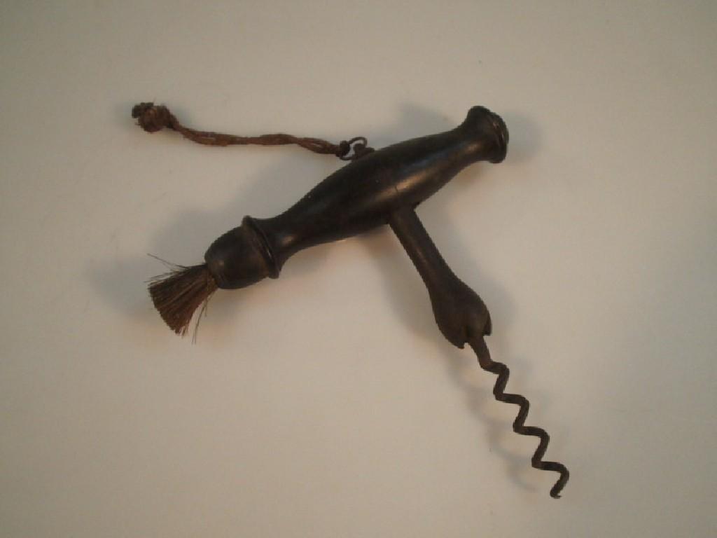 Appraisal: A Victorian ebonised King rack type corkscrew of turned form