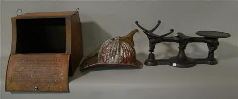 Appraisal: A FIREMAN'S HELMET WITH EAGLE DECORATION A SCHEPP'S COCONUT MANUFACTURER'S