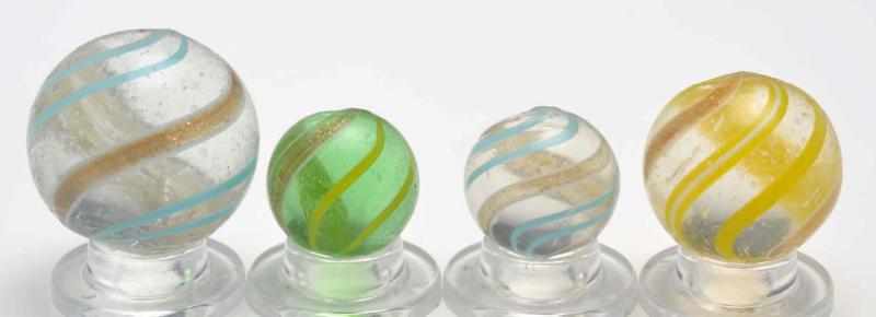 Appraisal: Lot of Lutz Marbles Description Includes two clear lutz marbles