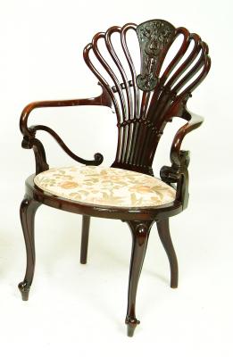 Appraisal: A LADY'S LATE VICTORIAN MAHOGANY ELBOW CHAIR the pierced fan