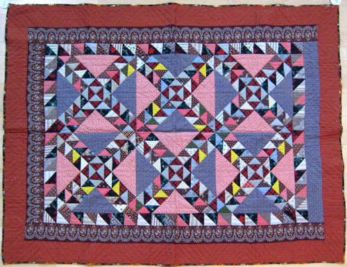 Appraisal: Pieced calico crib quilt late th c in the railroad