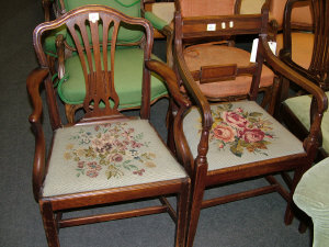 Appraisal: A mahogany open armchair early th century the shaped back