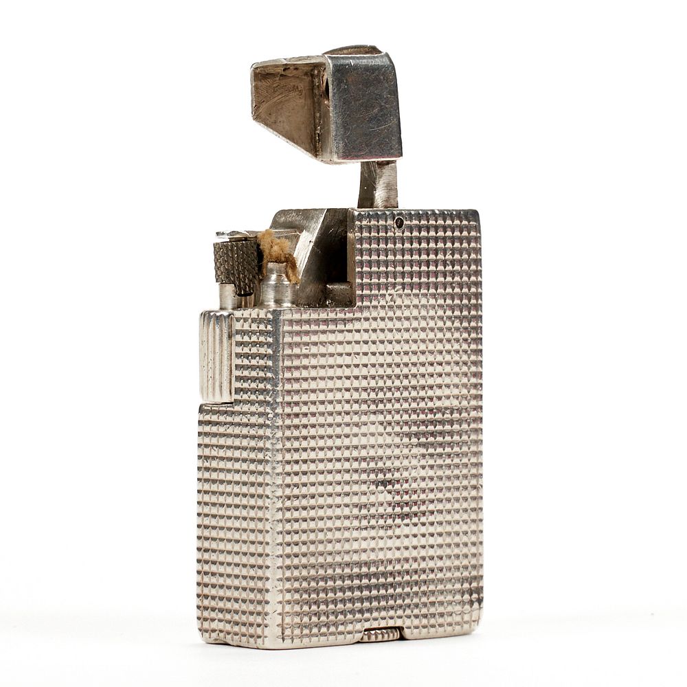 Appraisal: Dunhill Silver Alduna Lighter Dunhill United Kingdom Mid-century silver Alduna