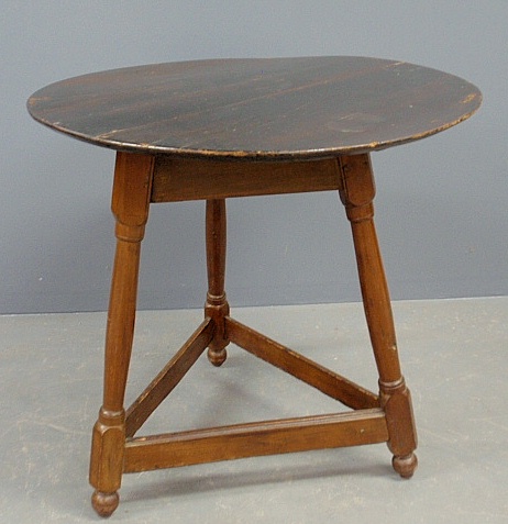 Appraisal: - Pennsylvania walnut tap table c with a circular top