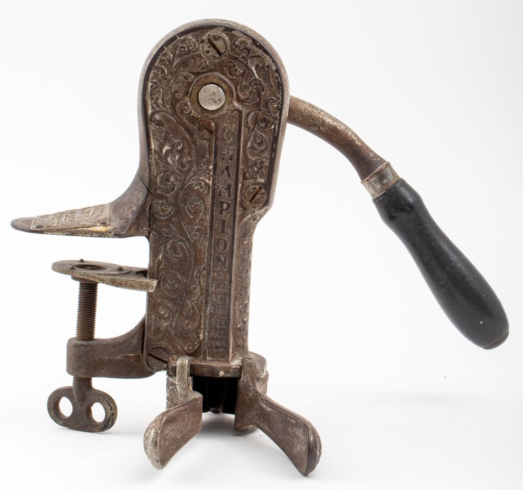 Appraisal: CHAMPION MODEL CAST-IRON TABLE-MOUNTED CORKSCREW Champion model cast-iron table-mounted Corkscrew