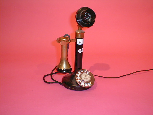 Appraisal: A candlestick telephone