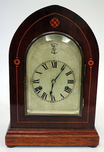 Appraisal: AN EDWARDIAN MAHOGANY CASED DOME TOPPED MANTLE CLOCK the engraved