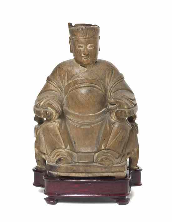 Appraisal: A Chinese Carved Wood Model of a Seated Gentleman late