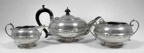 Appraisal: A George V silver three piece tea service with squat