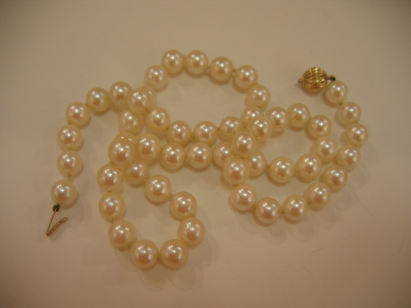 Appraisal: CULTURED PEARLS mm - mm cultured pearl necklace with k